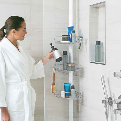 Lifestyle shot: Simplehuman Tension Shower Caddy, White/Polished Steel, adjustable shelves hold many large bottles.