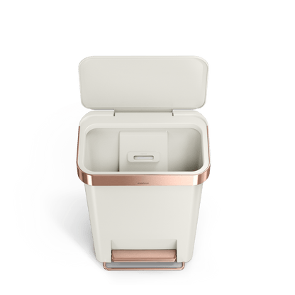 Open view of Simplehuman 45L Hybrid Rectangular Step Can, Cream/Rose Gold, showing internal liner pocket.