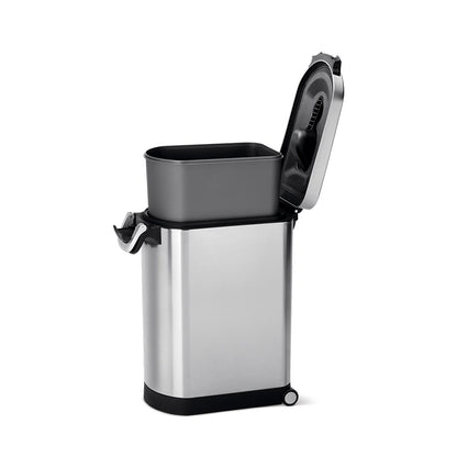 Angled view of Simplehuman Large Pet Food Can, Brushed Stainless Steel, open with removable food liner and wheels.