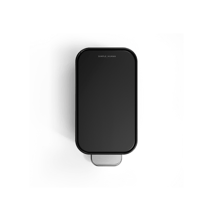 Simplehuman 5L Slim Step Can, Top view, Matte Black, showcasing narrow profile and stainless steel pedal.