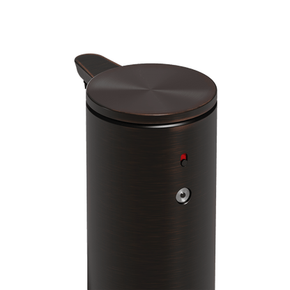 High-angle detail view of Simplehuman 9 oz. Rechargeable Sensor Pump (Dark Bronze), showing dosage control and power indicator.