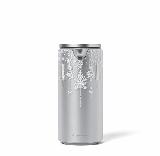 Simplehuman 9 oz. Holiday Sleeve in Silver Metallic with 2024 limited edition snowflake and pine tree design.
