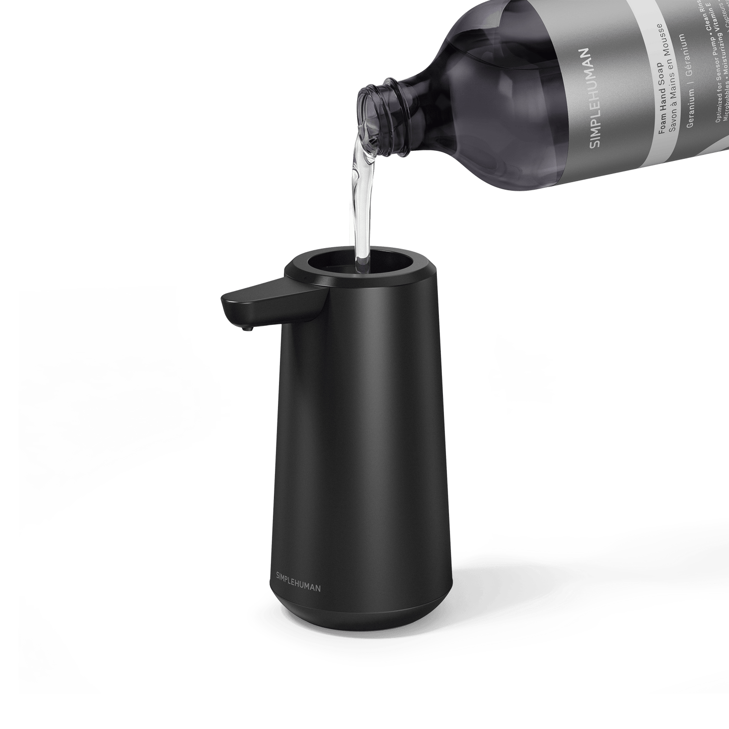 Simplehuman's Refill Bottle filling a Simplehuman Sensor Pump Foam.