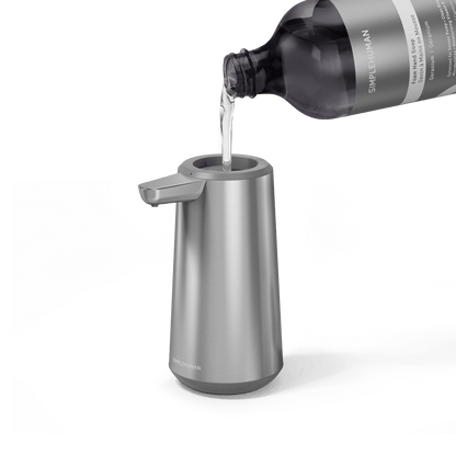 Simplehuman's Refill Bottle filling a Simplehuman Sensor Pump Foam.