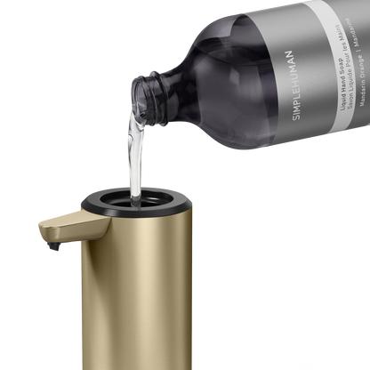Simplehuman's Refill Bottle filling a Simplehuman Liquid Sensor Pump.